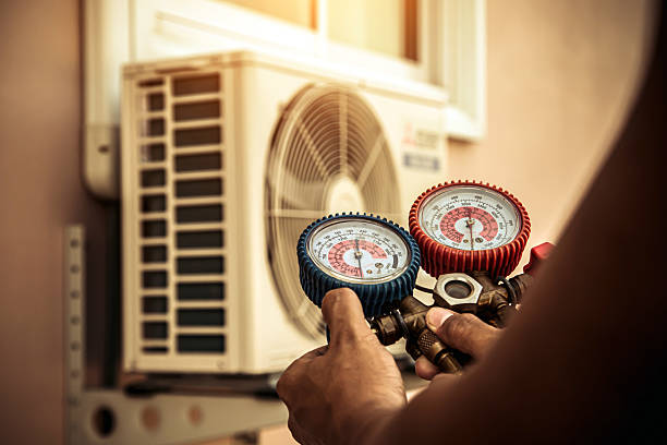 Professional Heat Pump Repair technician working in Spring Mount, PA